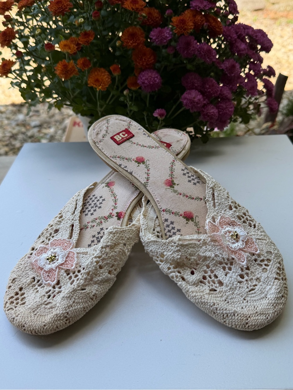 DC Footwear Cream Crochet Slip-On Women’s Flats with Pink Floral Accent